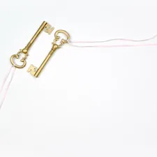 2 golden keys with pink ribbon | for more free images + business resources visit dragonflyave.com/free-goods related to Unlock the Secrets of DIY Valances: Free Sewing Patterns for Every Room