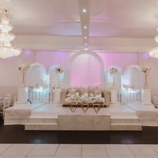 a banquet hall with tables and chairs and chandeliers related to Affordable Elegance: The Ultimate Guide to Cheap Platform Bed Frames