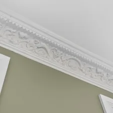 A bathroom with a mirror and a light fixture related to How to Make a Cornice Valance