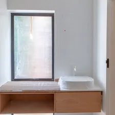 a bathroom with a sink and a window related to Bathroom Window Valances: A Comprehensive Guide