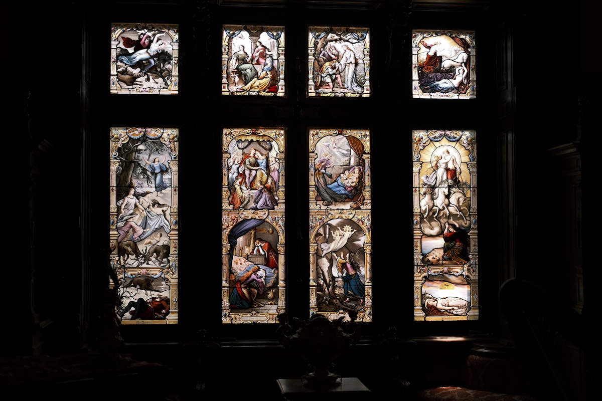 A beautiful window with stained glass. related to Elevating Window Style: The Art of Curtain Valances and Swags