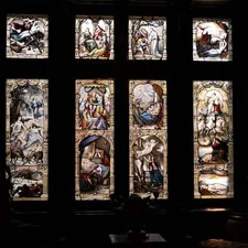 A beautiful window with stained glass. related to Elevating Window Style: The Art of Curtain Valances and Swags