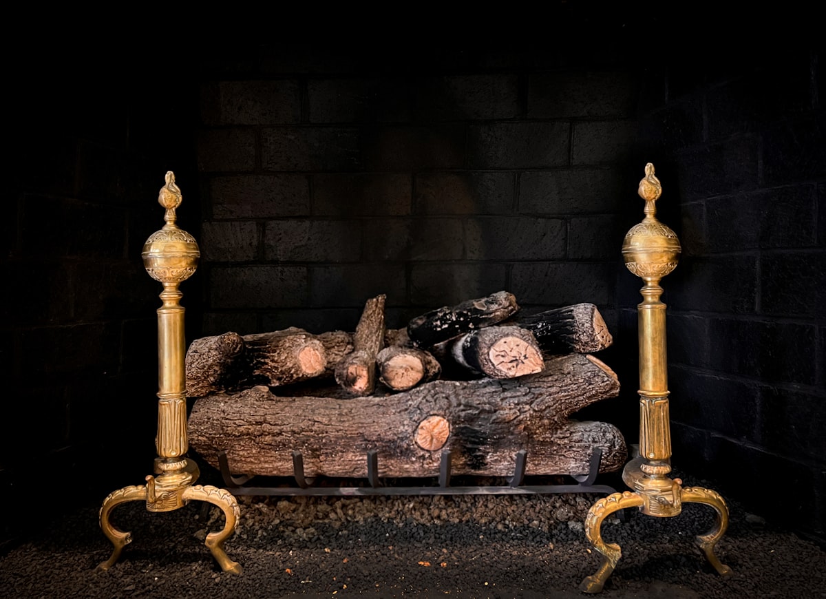 a bed made out of logs in a dark room related to Cast Iron Chiminea Stands: Your Comprehensive Guide