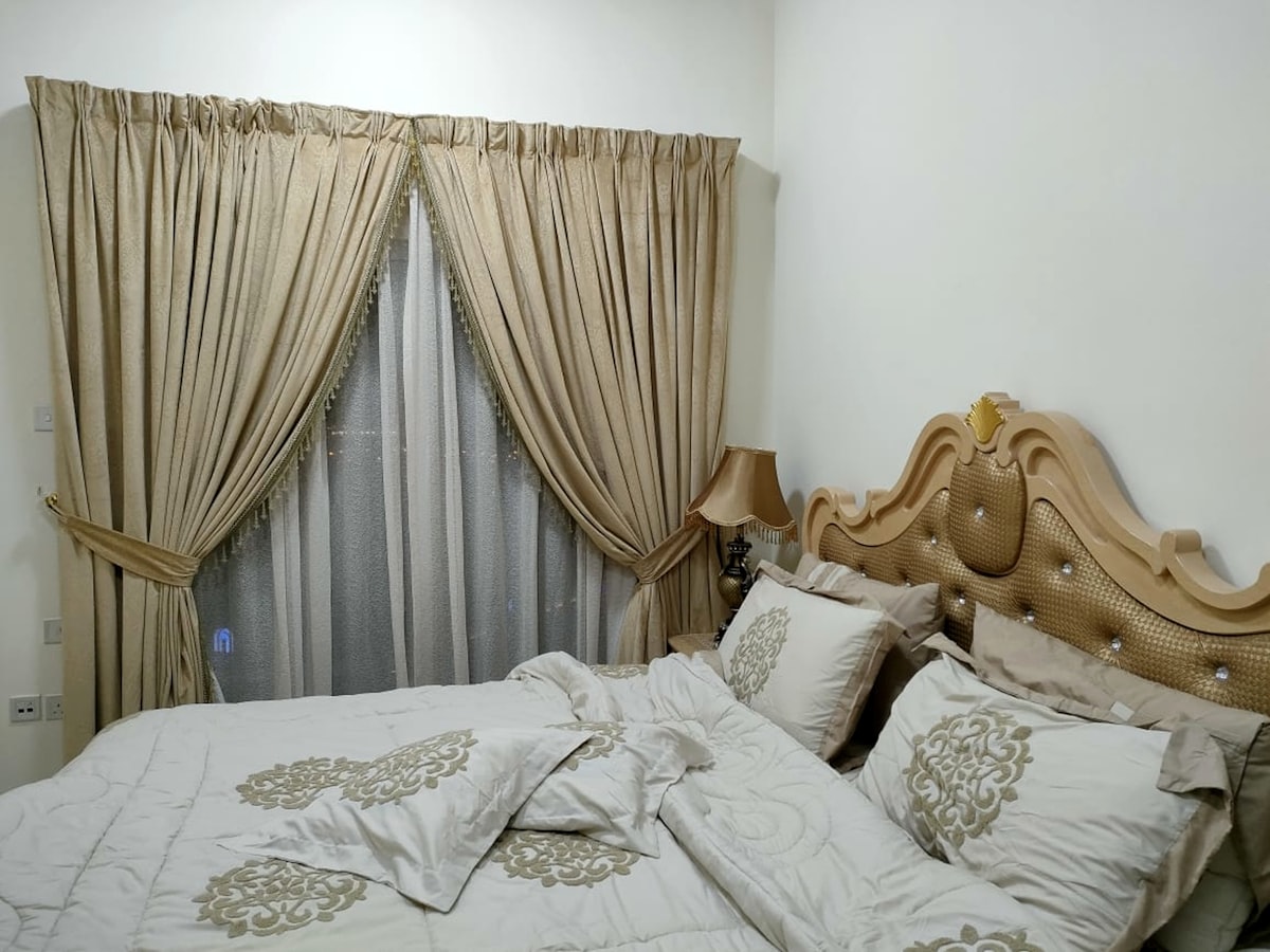 a bed with a white comforter and pillows related to Curtains with Attached Valance