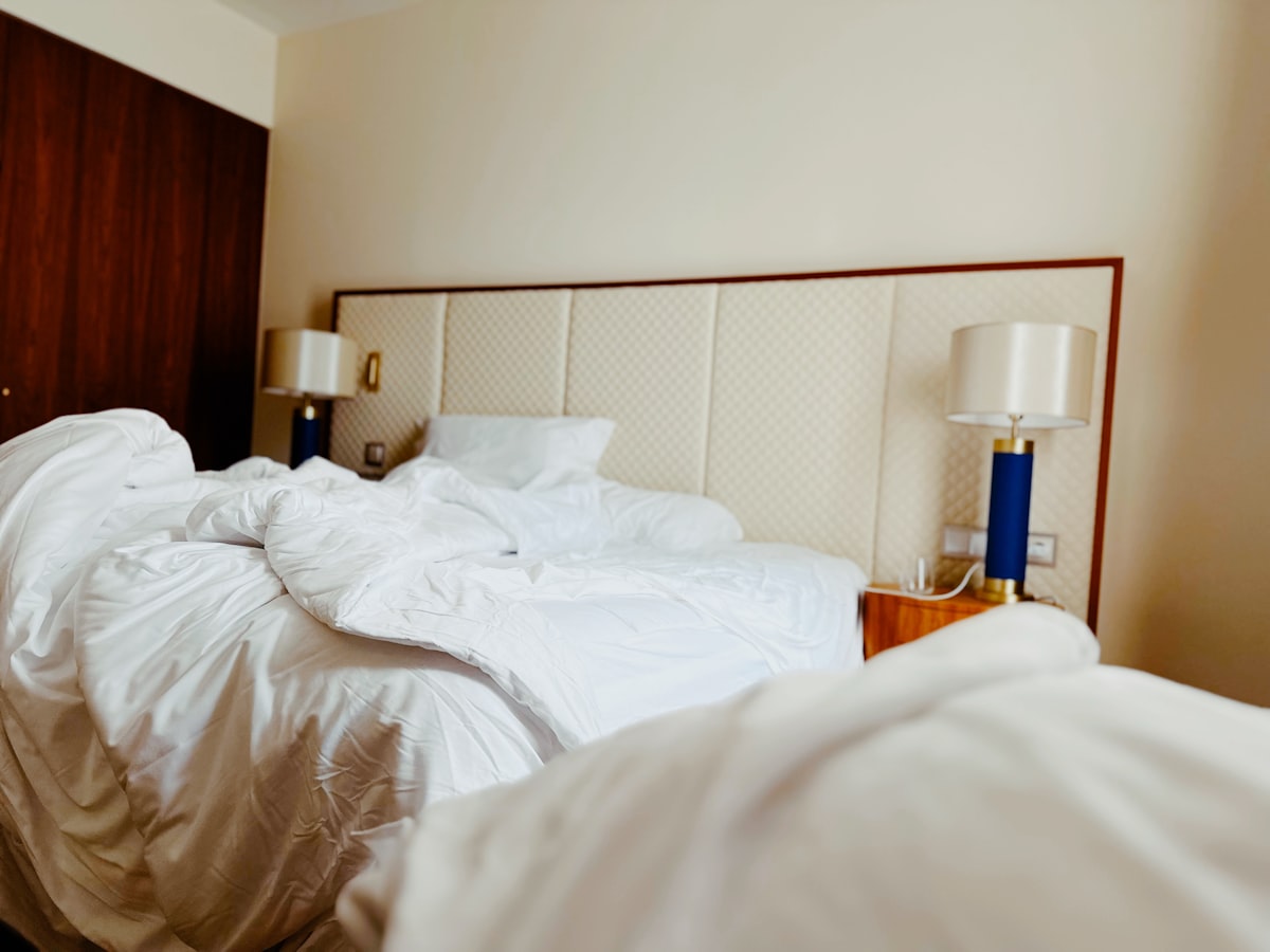 A bed with messy sheets after use. related to Bed Bug Infestation: Don't Panic, Here's What to Do!