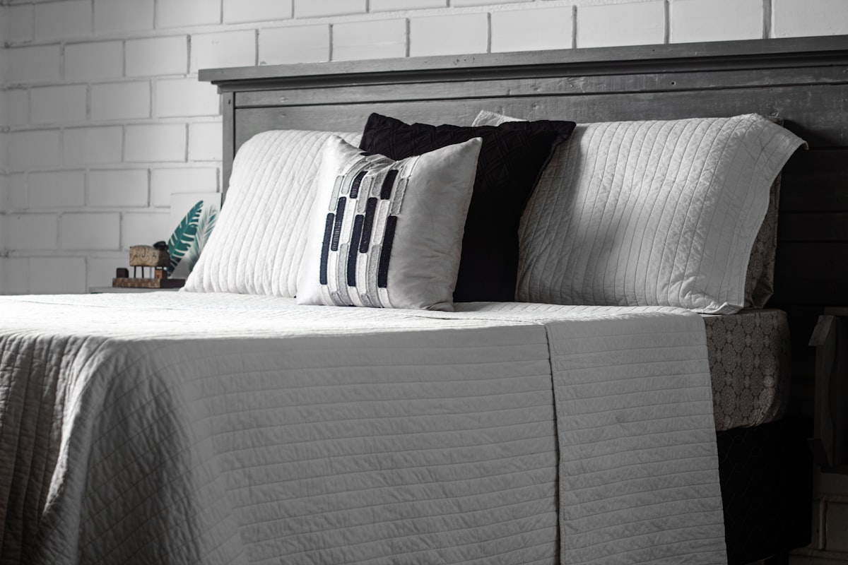 a bed with pillows related to California King Coverlet