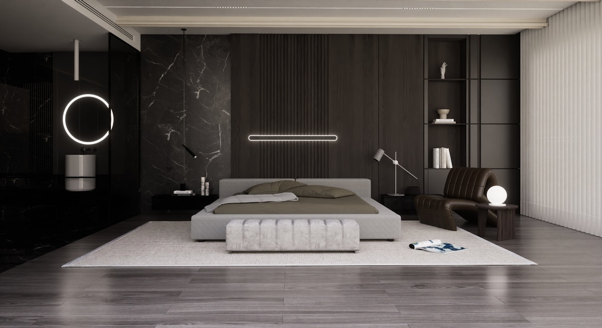 a bedroom with a large bed and a chair related to Sleek & Functional: Modern Platform Beds for Every Bedroom