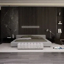 a bedroom with a large bed and a chair related to Sleek & Functional: Modern Platform Beds for Every Bedroom