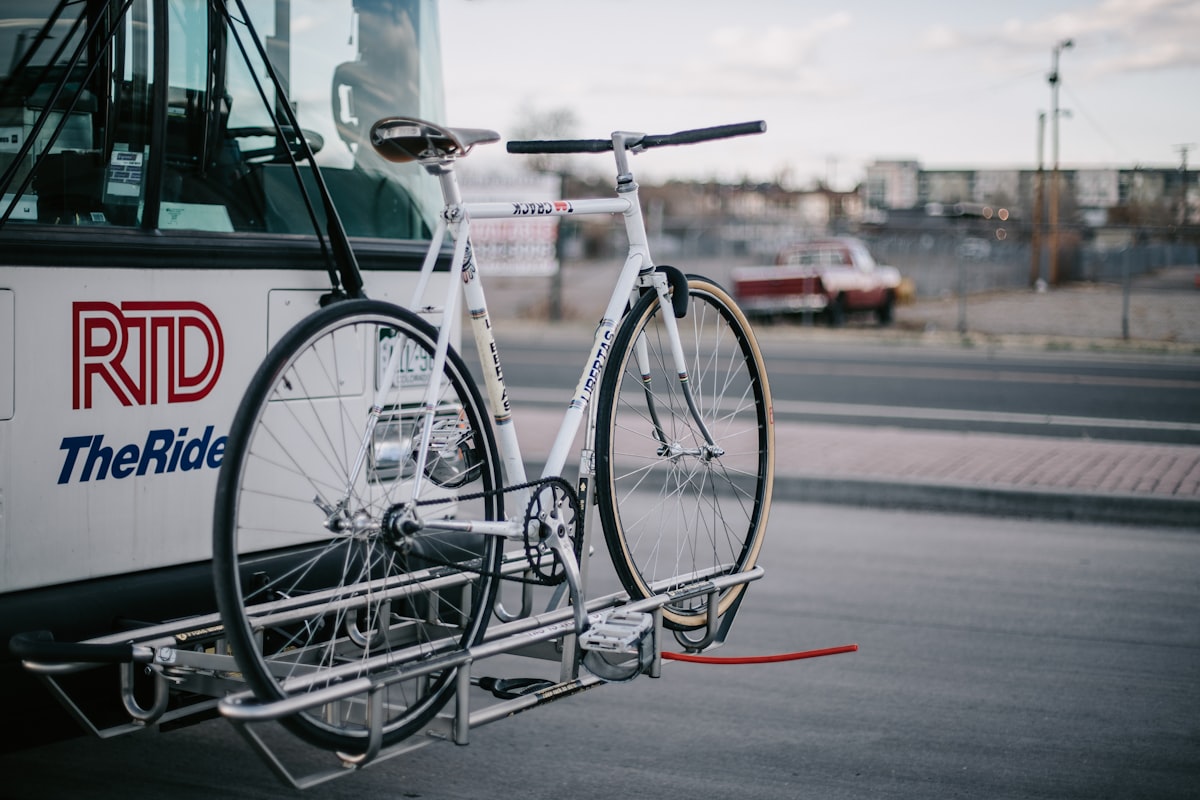 a bike is strapped to the front of a bus related to The Ultimate Guide to Choosing the Best Bike Racks for Truck Beds