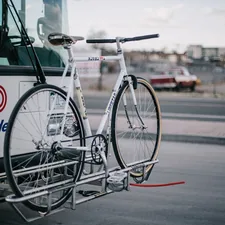 a bike is strapped to the front of a bus related to The Ultimate Guide to Choosing the Best Bike Racks for Truck Beds
