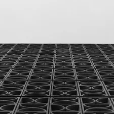 A black and white photo of a building related to The Ultimate Guide to Choosing the Perfect Rubber Bed Mat