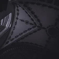 A black and white photo of a clock related to The Elegance of the Black King Canopy Bed: A Luxurious Addition to Your Bedroom