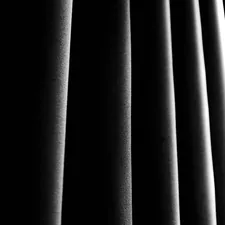 a black and white photo of a curtain related to Black Curtain Valance