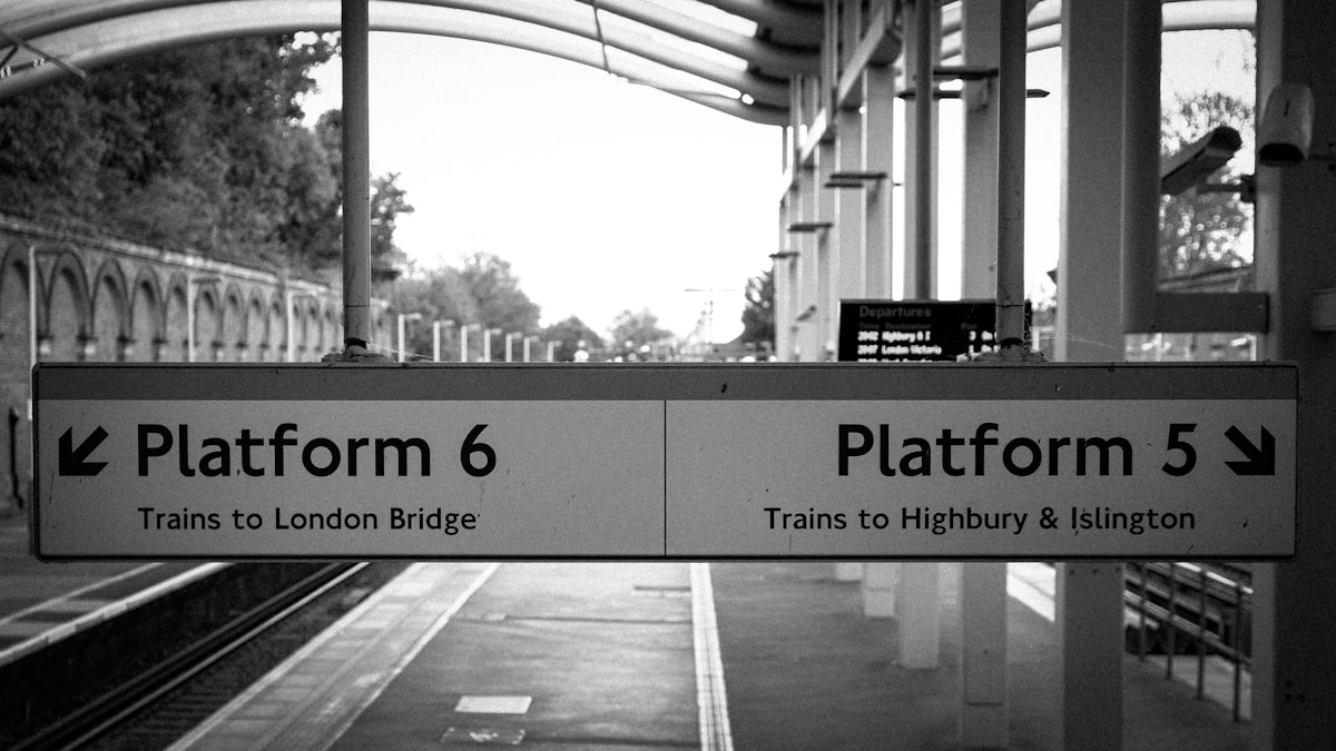 a black and white photo of a train platform related to The Ultimate Guide to Platform Canopy Beds