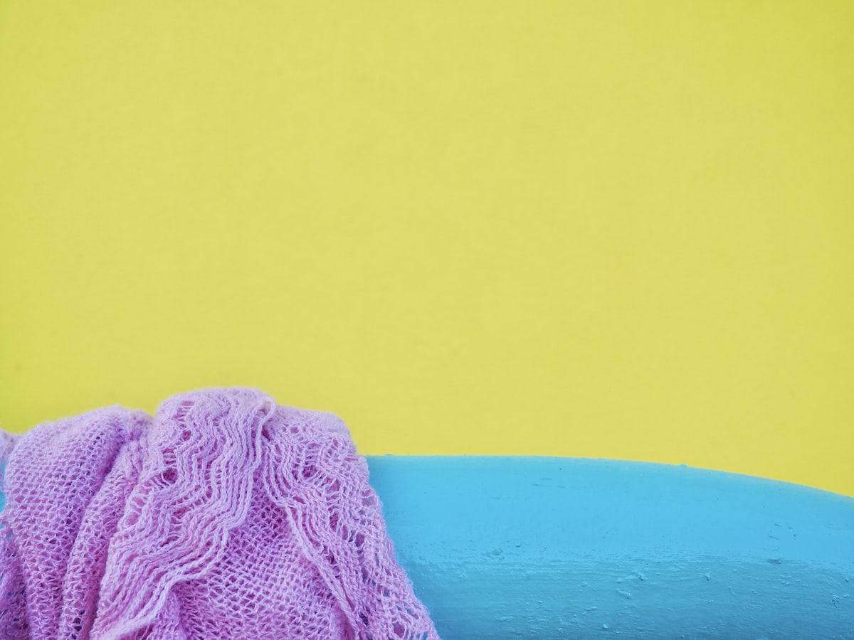 a blue and purple object on a yellow and blue background related to Transform Your Bedroom with Pink and Turquoise Bedding: A Perfect Blend of Color and Comfort