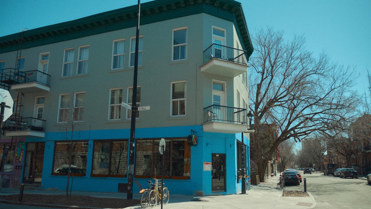 a blue building on a city street corner related to Exploring the Charm of Bed and Breakfasts in Traverse City, MI