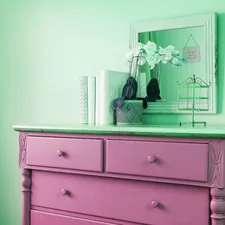 a blue dresser with flowers on top of it related to 10 Unique Painted Sideboards and Buffets to Elevate Your Home Decor