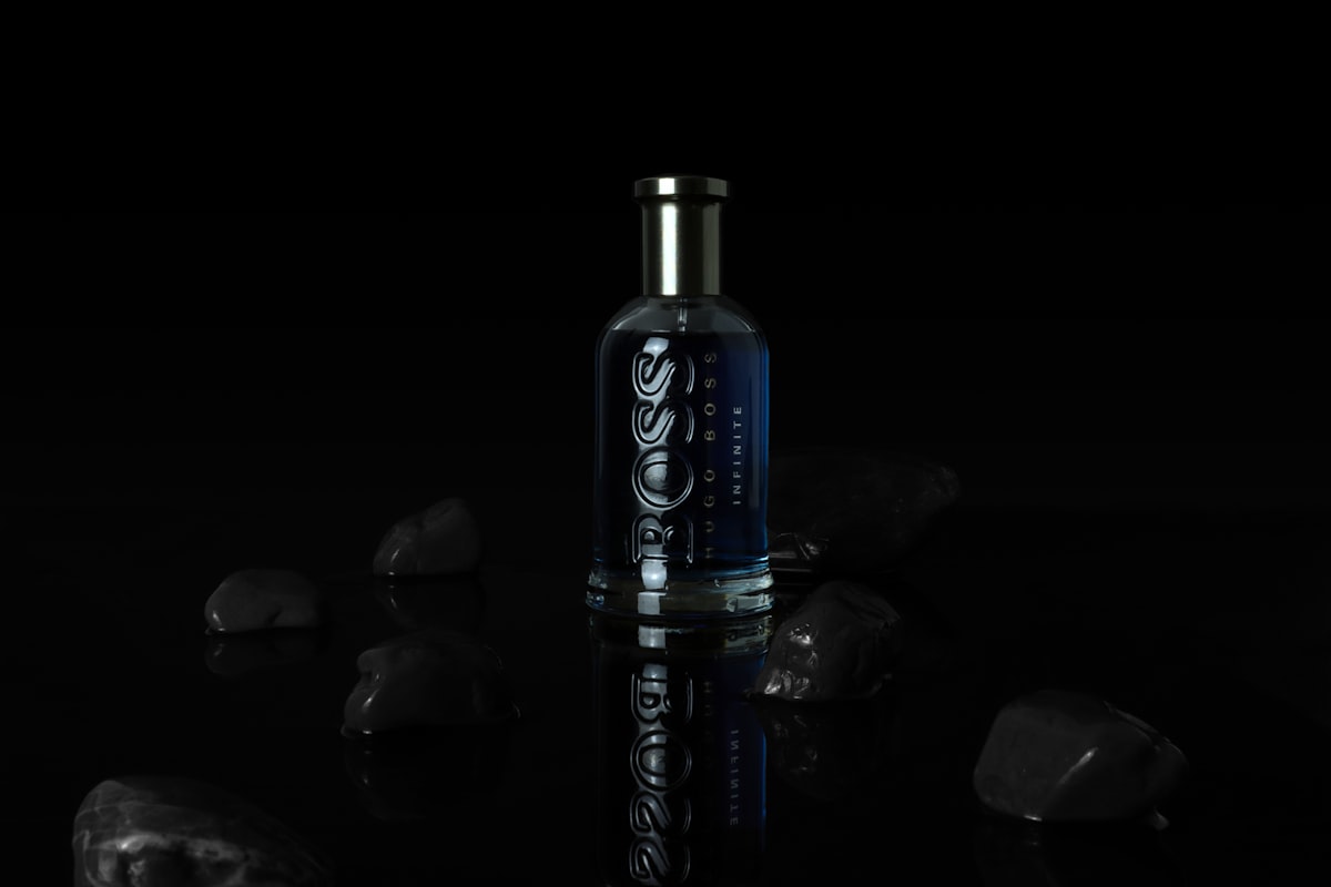 a bottle of vodka sitting on top of a table related to Elevate Your Bedroom with Hugo Boss Bedding: Luxury Meets Comfort