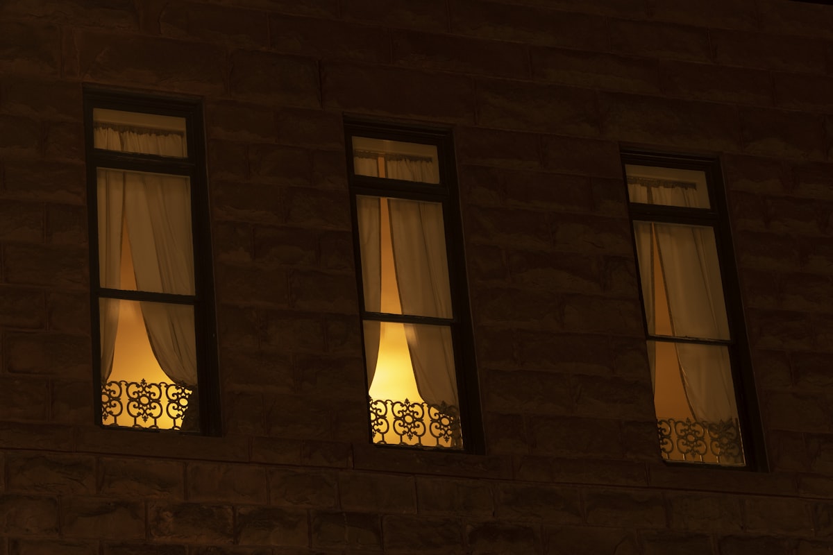 a brick building with windows related to Valances for Windows Ideas