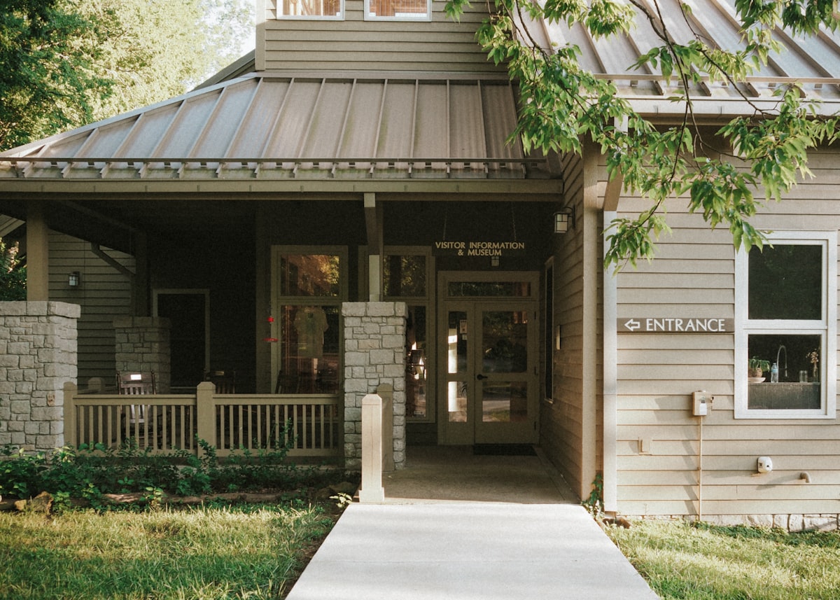a building with a metal roof and a porch related to Exploring the Charm of Bed and Breakfasts in Tennessee