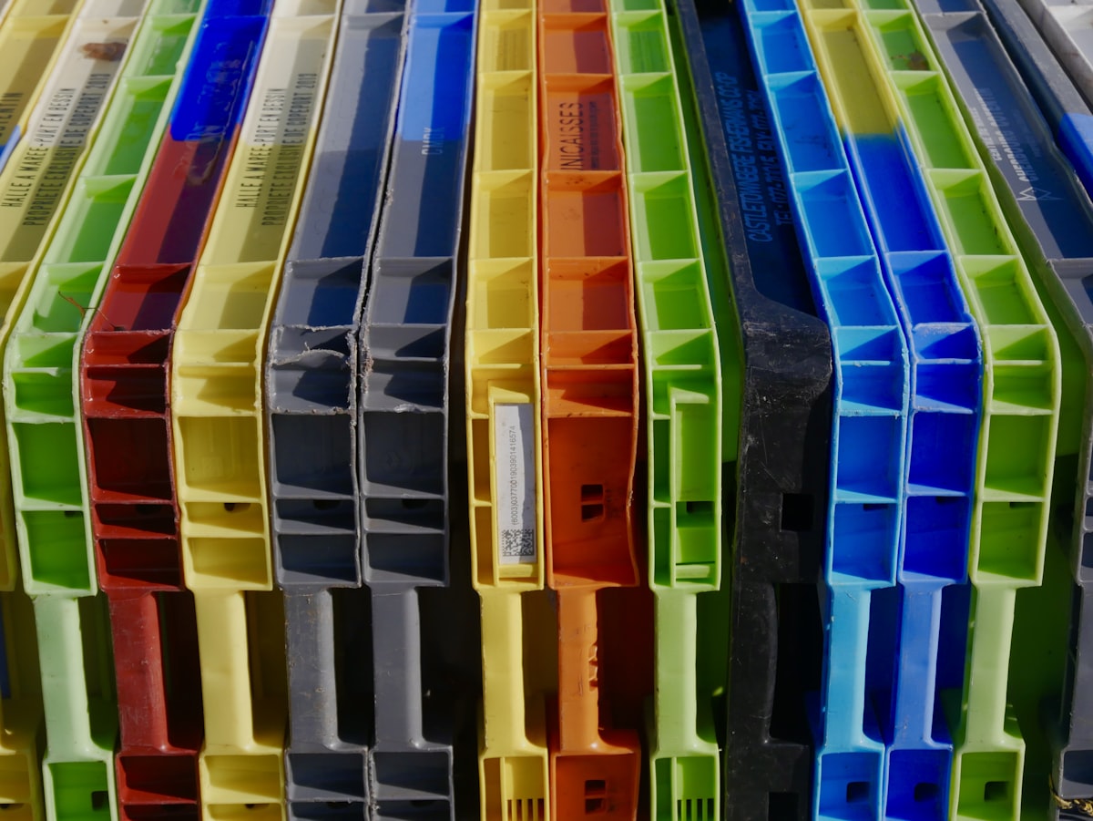 a bunch of different colored plastic containers stacked on top of each other related to Choosing the Right Bed Frame for Your Home