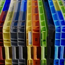 a bunch of different colored plastic containers stacked on top of each other related to Choosing the Right Bed Frame for Your Home