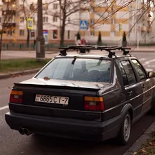 a car with a surfboard on top of it related to Upgrading with Style: MK4 Jetta Valance
