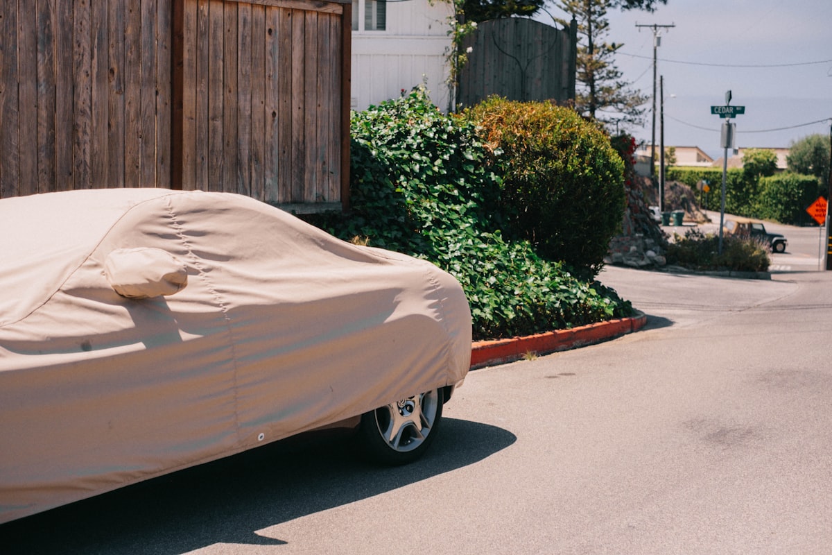 a cart with a white cover on it related to The Ultimate Protection: Choosing the Perfect Large Chiminea Cover