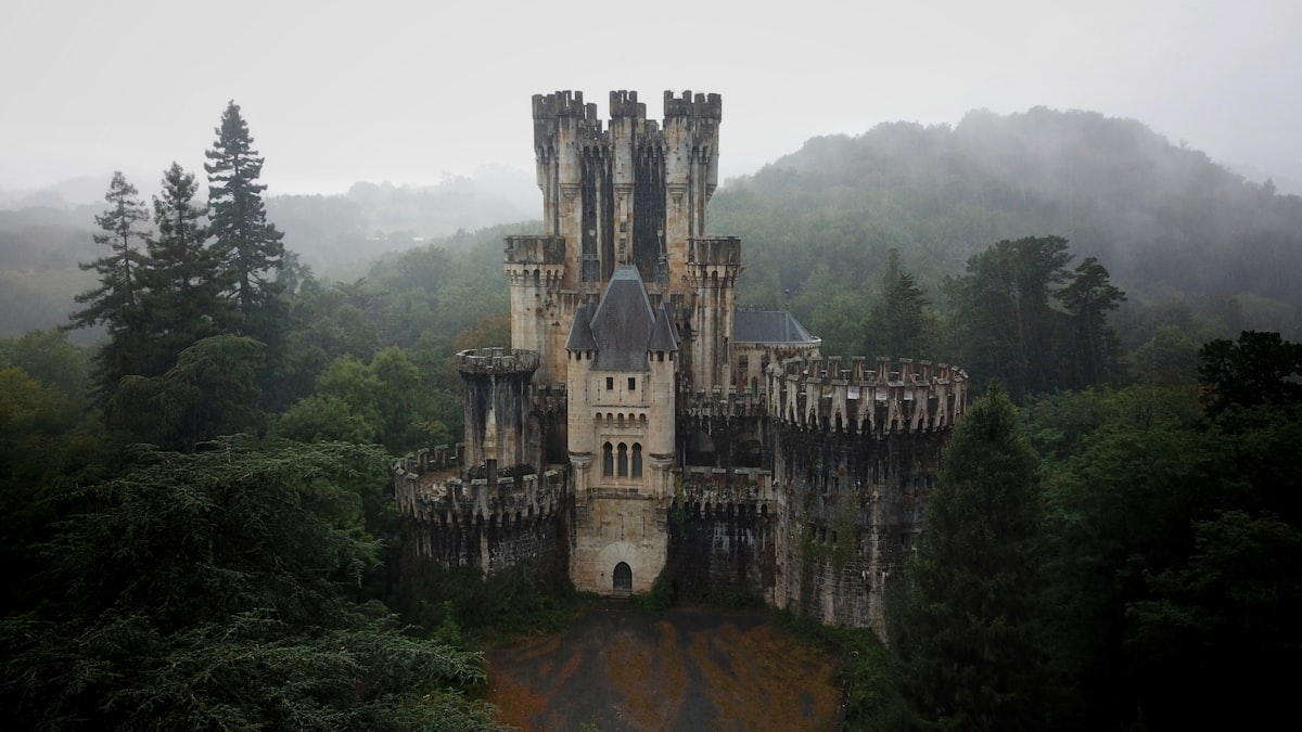 A castle wrapped in fog in the north of spain related to Enchanting Escapes: Discovering the Charm of Castle Bed and Breakfasts
