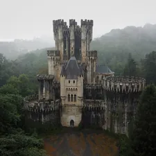 A castle wrapped in fog in the north of spain related to Enchanting Escapes: Discovering the Charm of Castle Bed and Breakfasts