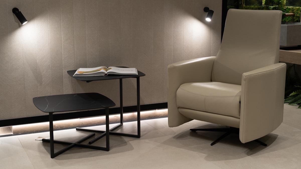 A chair and a table in a room related to The Ultimate Guide to Recliner Bed Chairs: Comfort and Functionality Combined