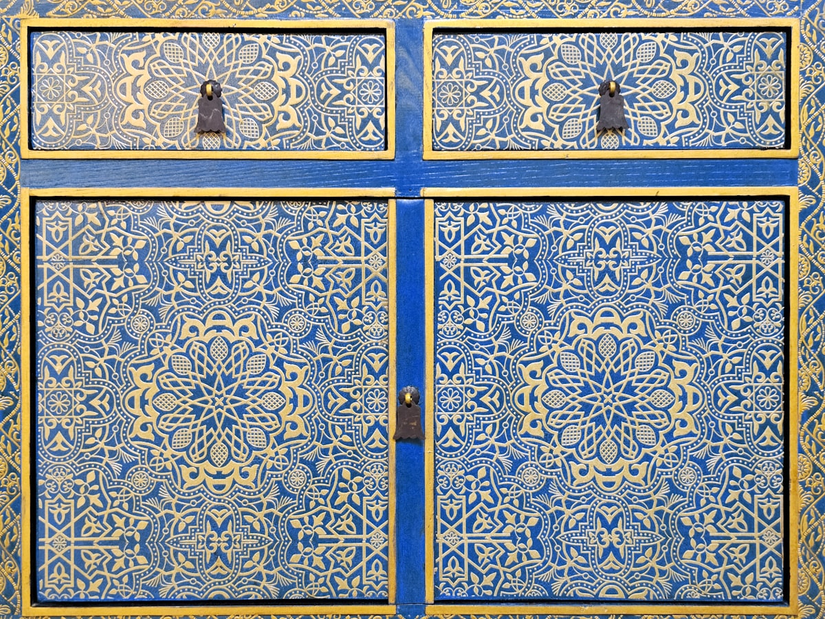 A close up of a blue and yellow cabinet related to Spanish Style Sideboards: Adding a Touch of Andalusian Elegance to Your Home
