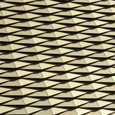 a close up of a building with many squares on it related to Gold Quilted Coverlet: A Luxurious Bedding Option