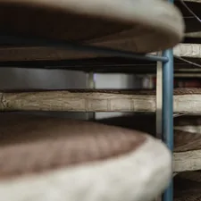 a close up of a bunch of bread on a rack related to Find Your Dream Bed: Top Beds for Sale
