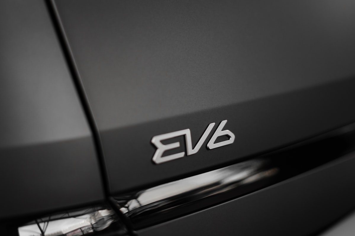 a close up of a car's logo related to Elevate Your Style with Black Scarf Valance