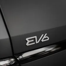 a close up of a car's logo related to Elevate Your Style with Black Scarf Valance