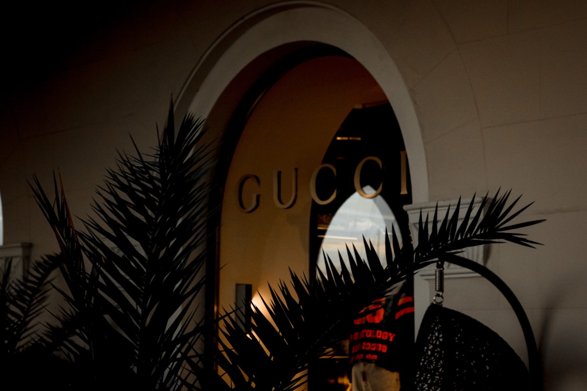 a close up of a clock on the side of a building related to Gucci Bed Set: The Ultimate Luxury for Your Bedroom