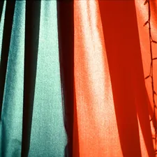 a close up of a curtain with a plant on it related to Exploring Different Valance Styles