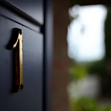 a close up of a door handle on a door related to The Ultimate Guide to Black Sideboard Cabinets