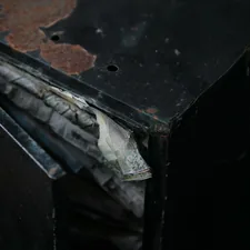 a close up of a piece of metal with rust on it related to Revamping Your Home with a Distressed Black Sideboard