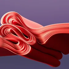 A close up of a red ribbon on a purple background related to Red Coverlet Twin: A Comprehensive Guide