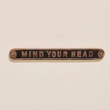 a close up of a sign related to Adding a Touch of Whimsy to Your Home with a Live Laugh Love Valance