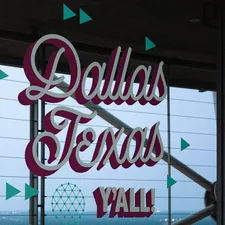 a close up of a sign on the side of a building related to Charming Escapes: Discover the Best Dallas Bed and Breakfasts