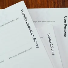 a close up of a stack of papers on a table related to Semi Custom Valances: A Comprehensive Guide