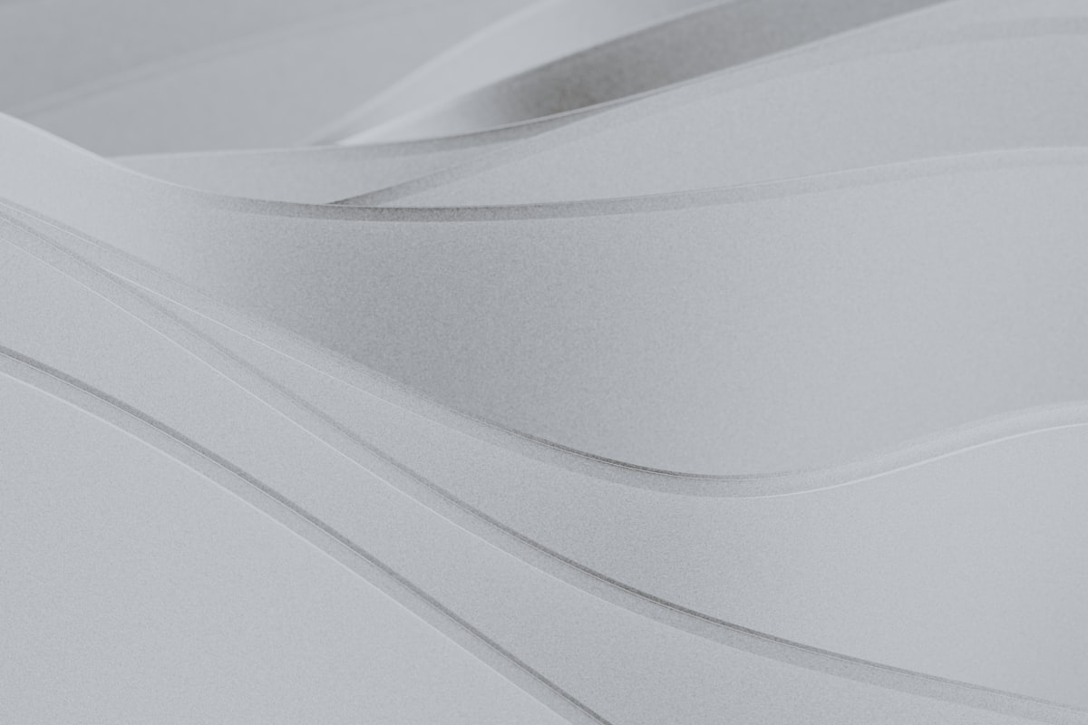 a close up of a white surface with wavy lines related to Add a touch of elegance with White Wood Valance