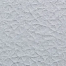 a close up of a white textured wall related to White Quilted Coverlet