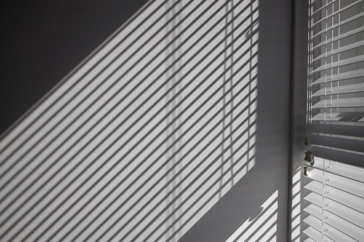 a close up of a window with blinds on it related to Venetian Blind Valance Clips