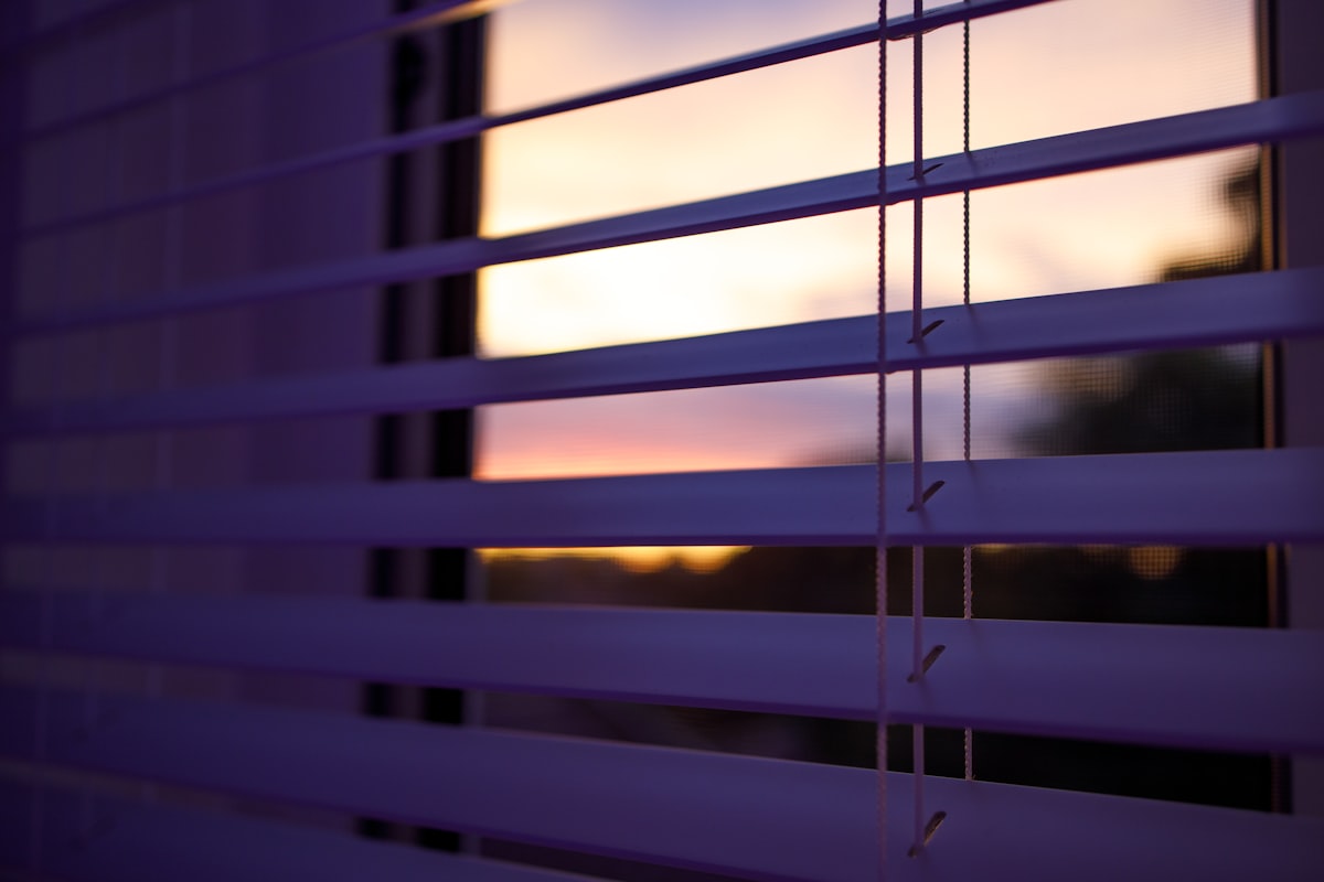 a close up of a window with the blinds closed related to Venetian Blind Valance Clips
