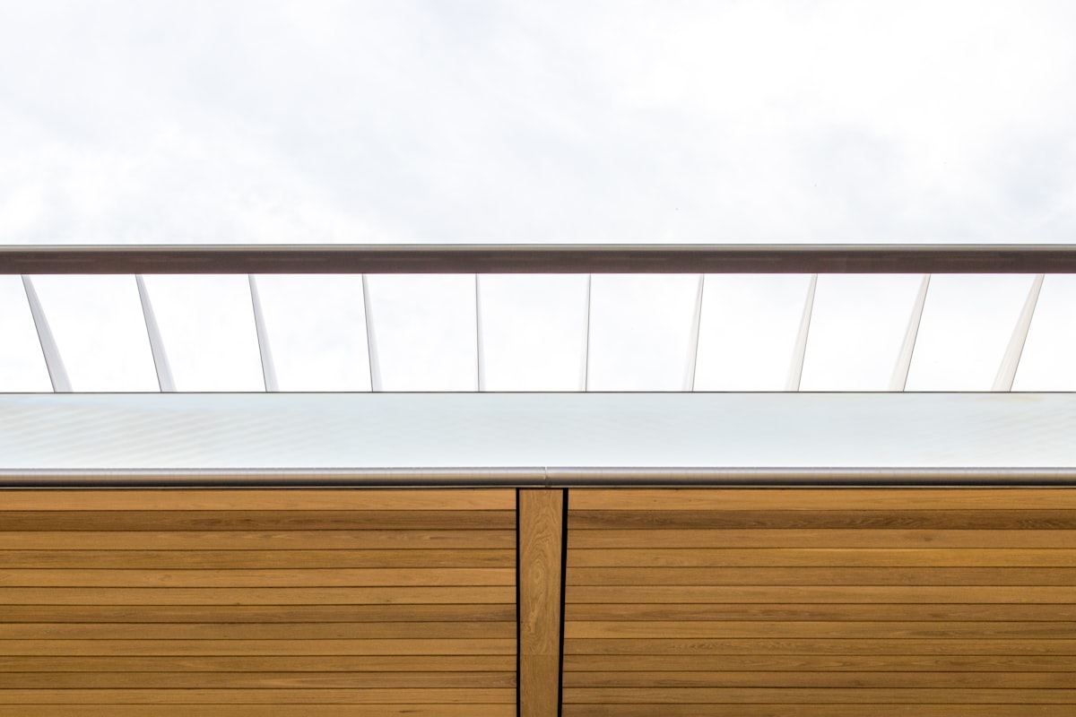 a close up of a wooden cabinet with a sky background related to Elevate Your Home Decor with a Marble Top Sideboard