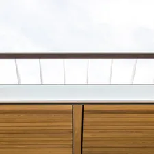 a close up of a wooden cabinet with a sky background related to Elevate Your Home Decor with a Marble Top Sideboard